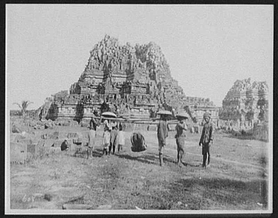 Coolies with sedan chairs in front of ruins of Hindu temple of…, Java, Indonesia, 1895