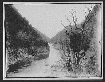 Looking up Manawatu Gorge - railroad track at left, New Zealand, Manawatu River, 1895