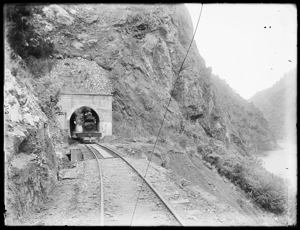 Locomotive in mouth of tunnel - Manawatu Gorge, Manawatu River, New Zealand, 1895