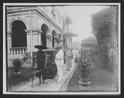 Canton - Joseph G. Pangborn beside sedan chair, Guangzhou, China, 1895
