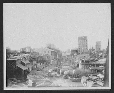Urban canal jammed with sampans, China, 1895