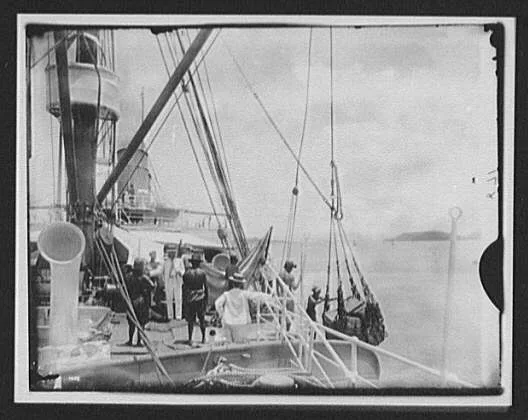 Unloading cargo from deck of steamer, China, 1895