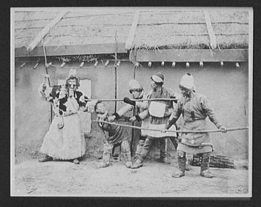 Goldi tribesmen acting out folk drama, "The repulse of the kidnapper", Russia, 1895