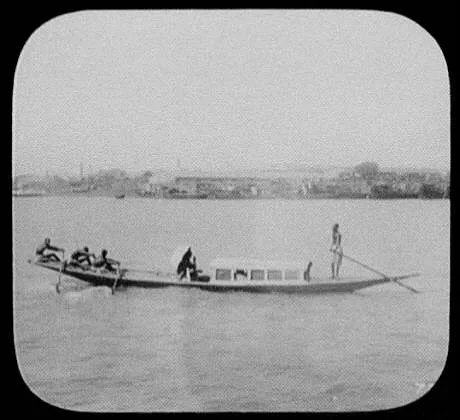 Calcutta - 3 oarsmen pulling long, narrow passenger boat, India, Calcutta, 1895