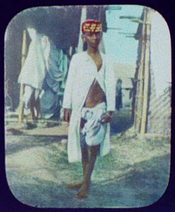Young boy standing on street, Java, Indonesia, 1895