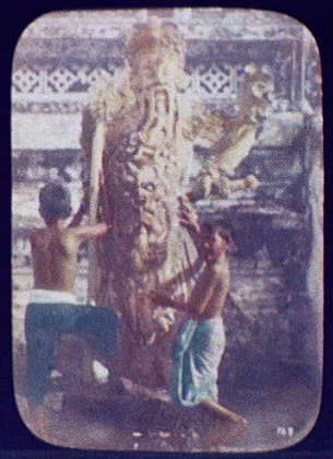 Bangkok - detail of Wat Chang; 2 small boys at foot of warrior figure, Thailand, Bangkok, 1895