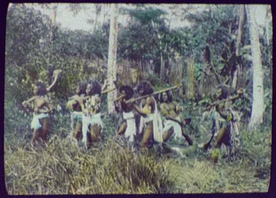 Seven warriors in jungle, two dragging dead (?) body, Oceania, 1895