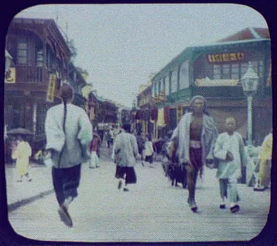 Crowded street scene, China, 1895