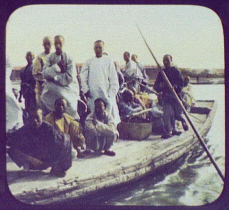 Chinese men on ferry boat, China, 1895