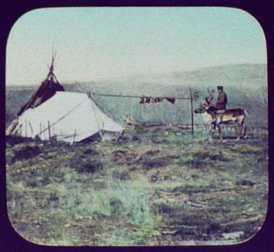 Soldier riding reindeer at survey camp of Eastern Siberian Railway, 1895