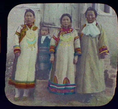 Wives of Goldi chiefs in their best clothes, Siberia, 1895