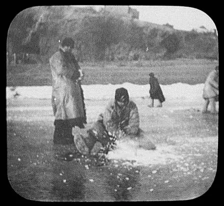 Chopping hole in Amur River for ice fishing, Russia, China, Amur River, 1895