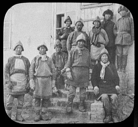 Ten Goldi posed in front of bldg, Siberia, 1895