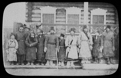 Ten men and boys "Yemschiks" standing in front of post house on Great…, Siberia, 1896