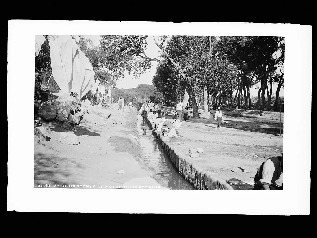 Bathing scene at hot springs acequia, Aguascalientes (State), 1880